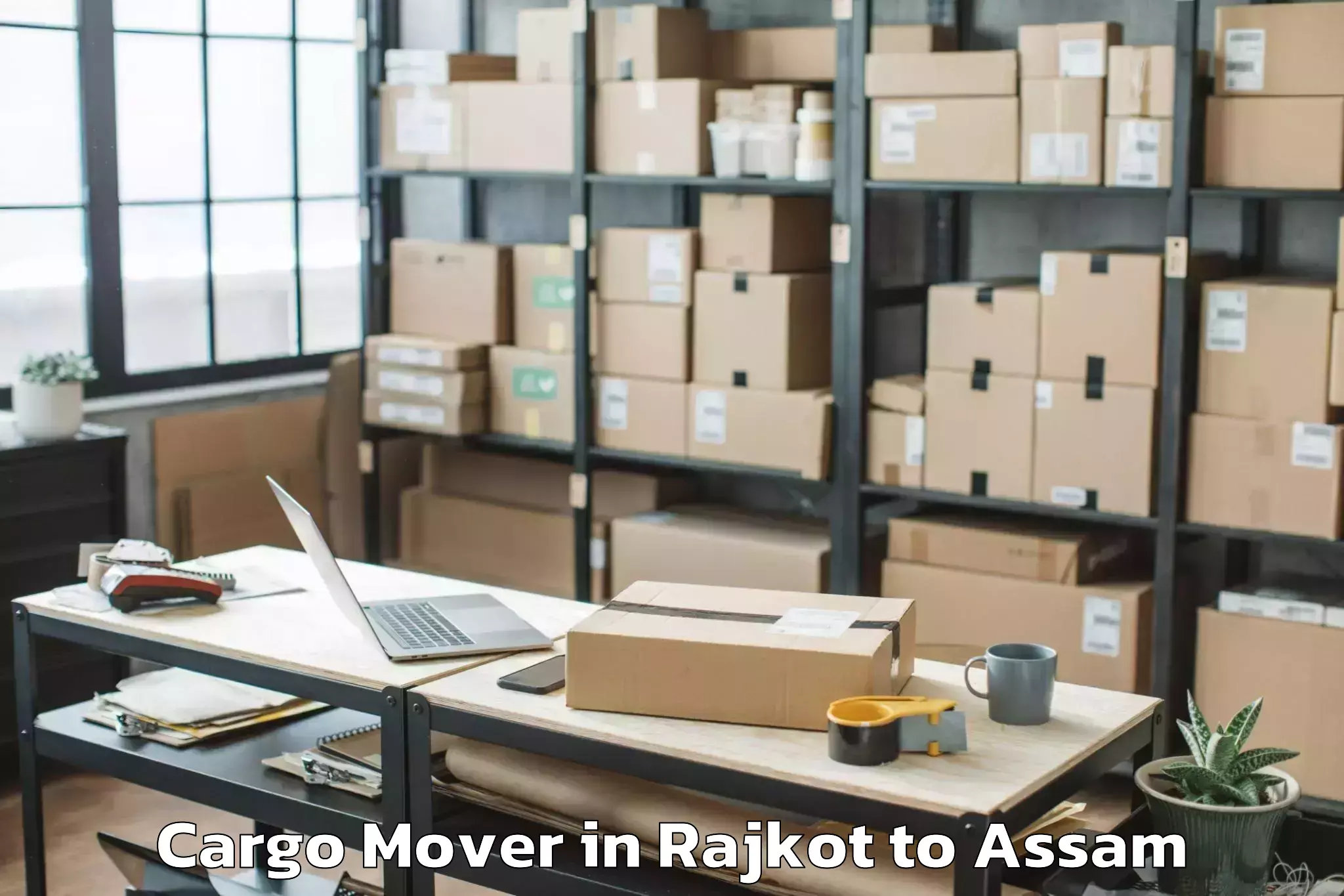 Top Rajkot to Pathorighat Pt Cargo Mover Available